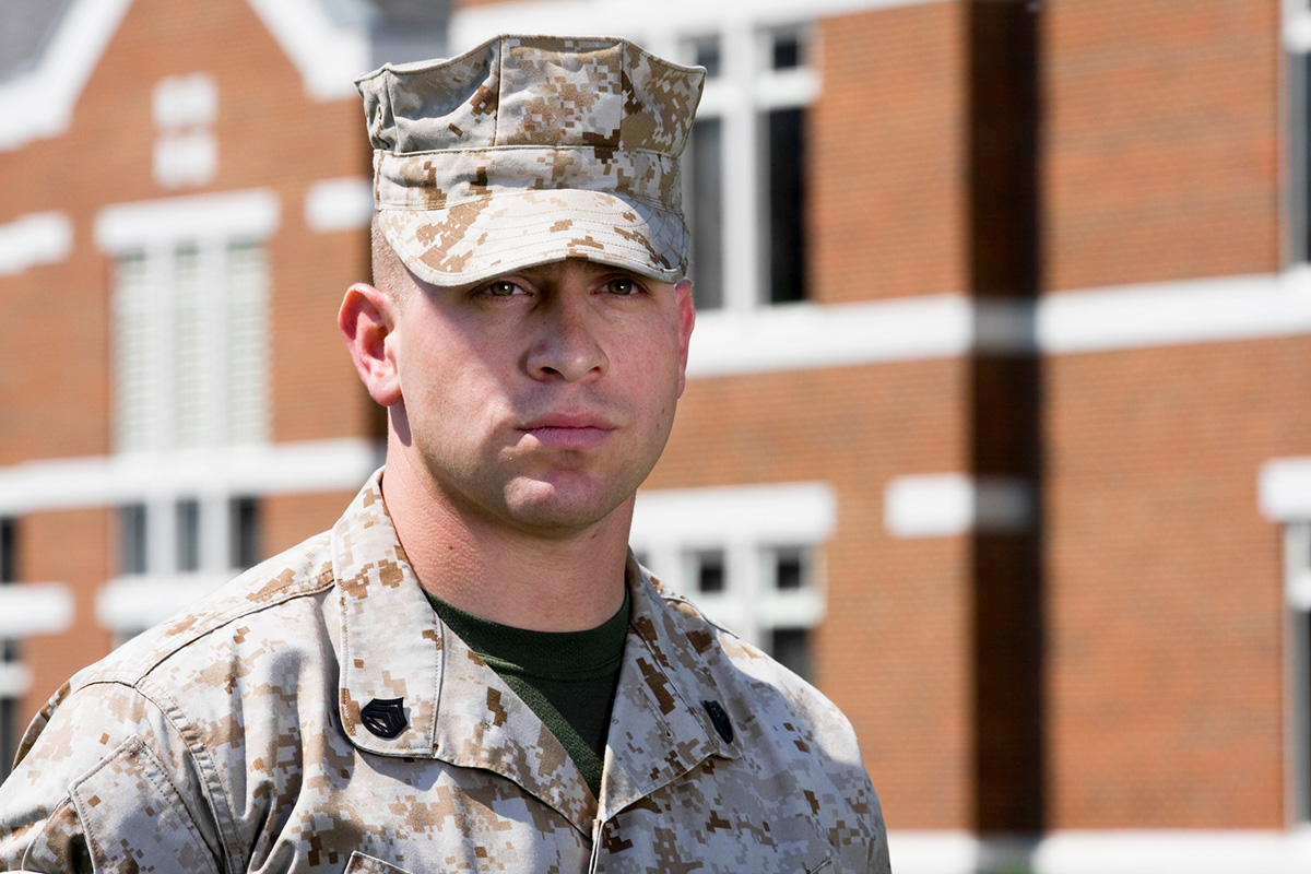 Marine in front of building
