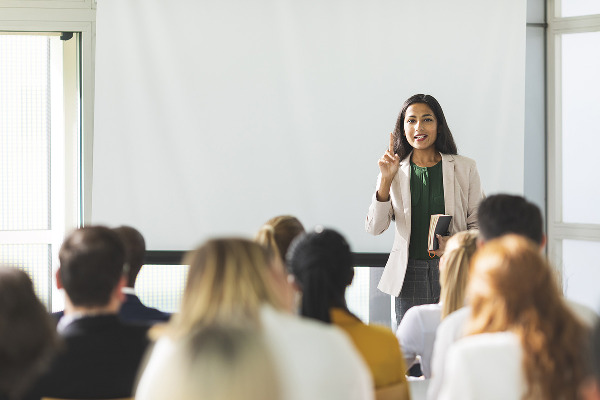 woman speaking to group